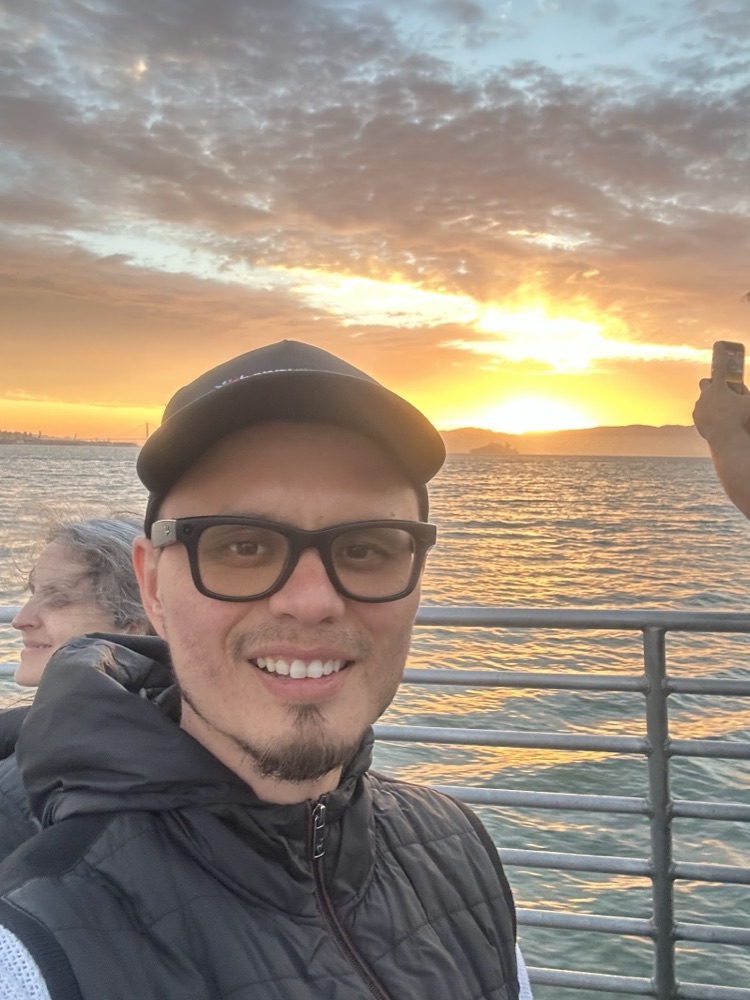 Max at the ocean at sunset