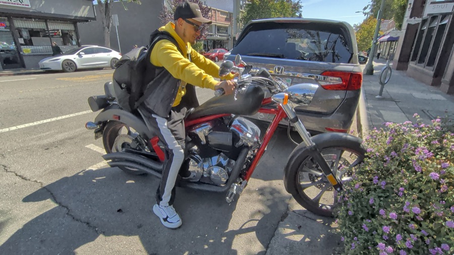 Max on a motorcycle in the California sun